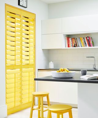 Modern kitchen with yellow shutters