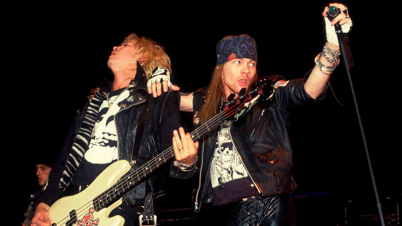 Guns N&amp;rsquo; Roses&amp;rsquo; Duff McKagan and Axl Rose performing onstage in 1988