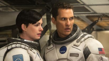 Matthew McConaughey as Joseph "Coop" Cooper and Anne Hathaway as Dr. Amelia Brand in Interstellar.