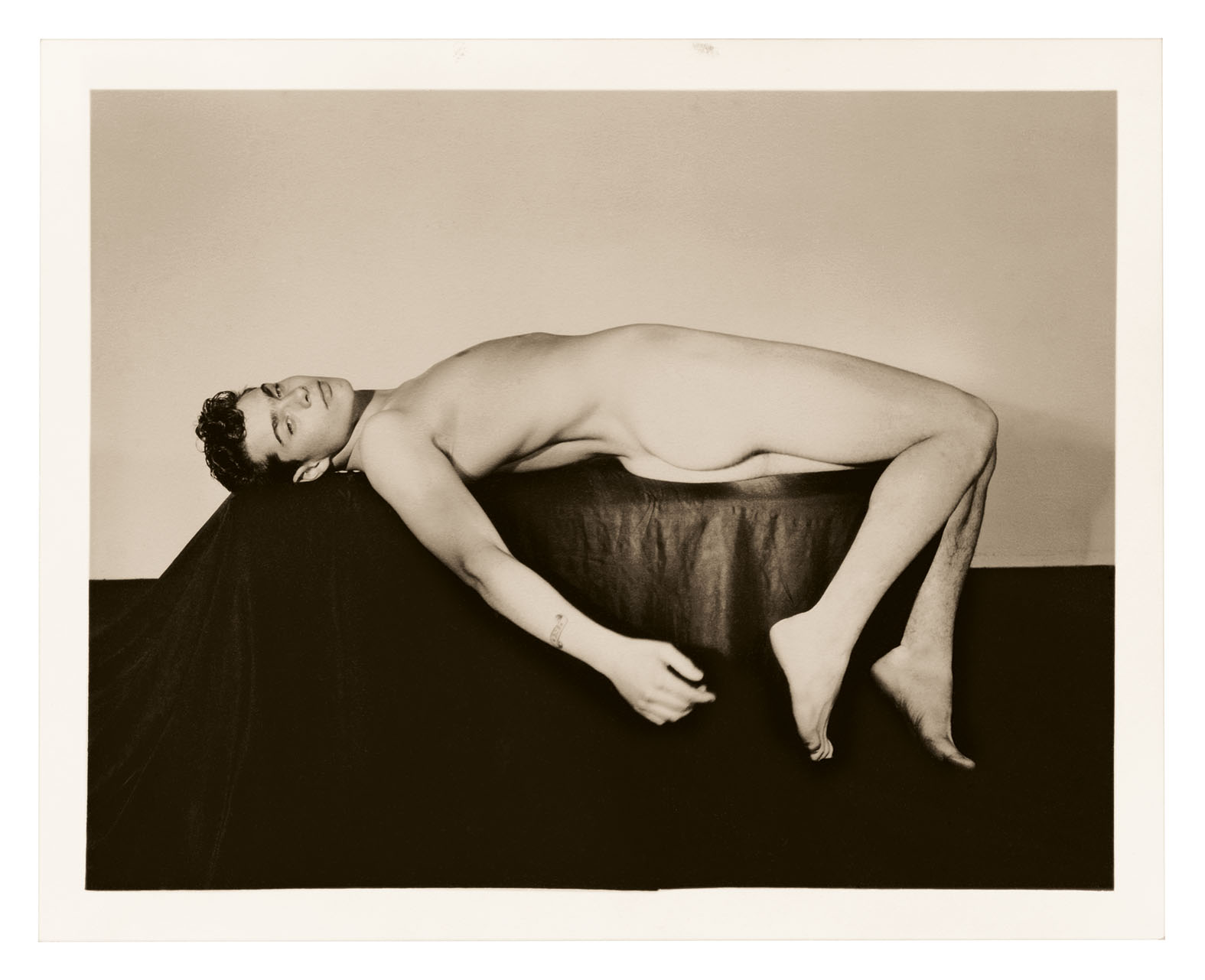 black and white image of naked men