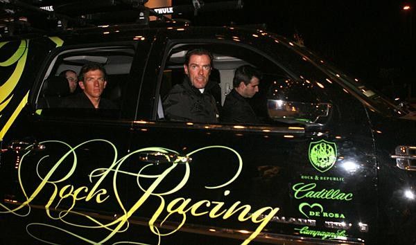 Mario Cipollini (front passenger seat) and Tyler Hamilton (rear seat)