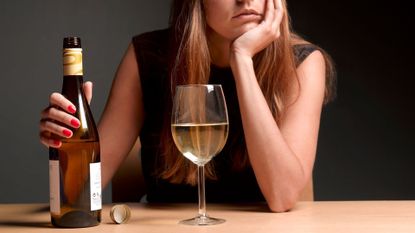 woman drinking alcohol