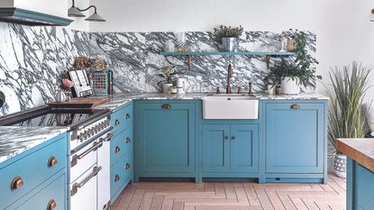 Blue shaker kitchen with butlers sink