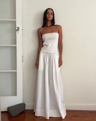 Woman in white maxi dress.