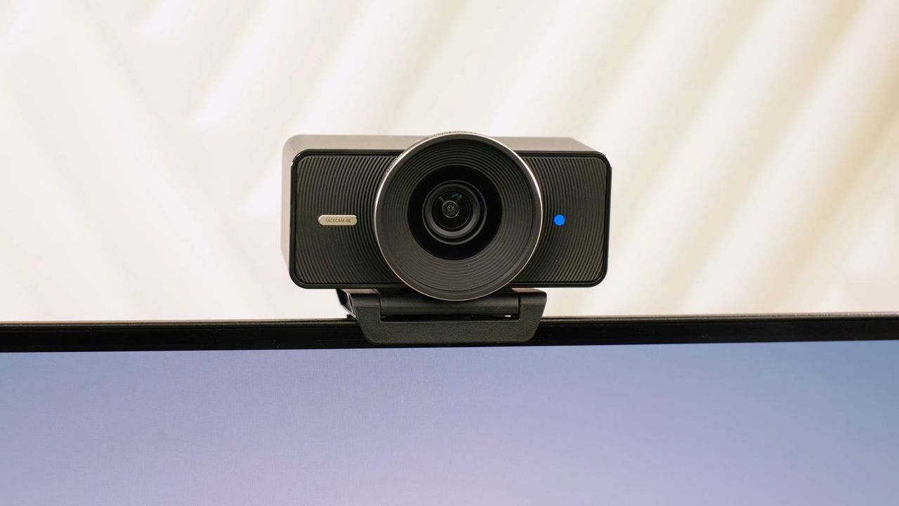 The Elgato Facecam 4K sitting on top of a monitor