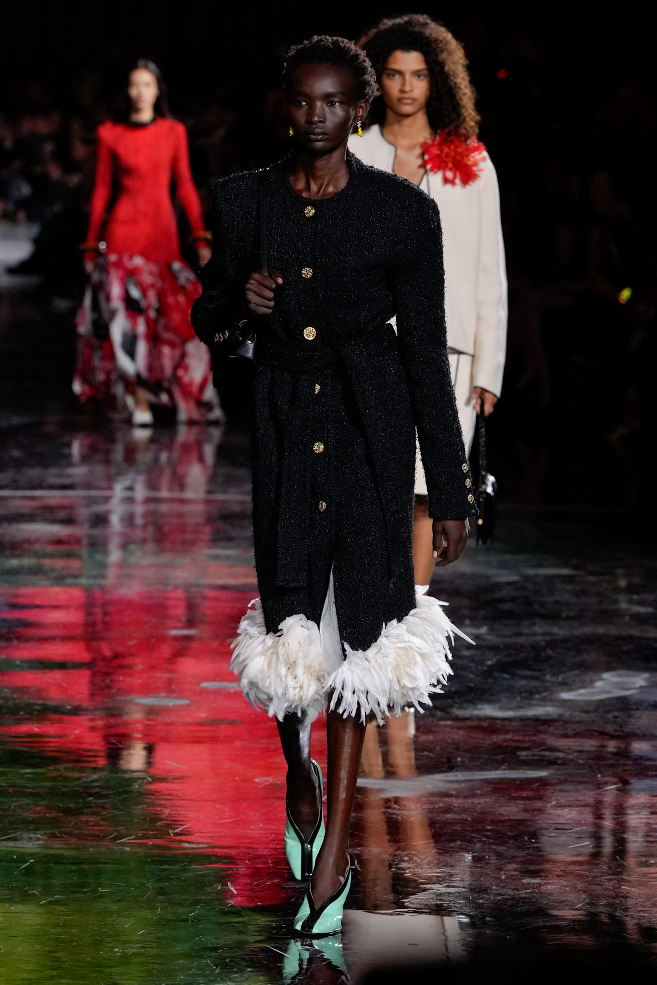 a model wearing Chanel on the runway