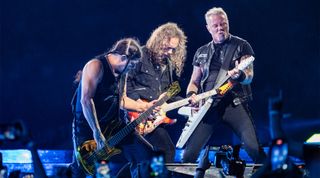 Bassist Robert Trujillo, lead guitarist Kirk Hammett and guitarist, lead vocalist and songwriter of Metallica performs live on stage at Lumen Field on August 30, 2024 in Seattle, Washington.