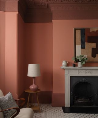 White and black floor and fireplace, pink walls