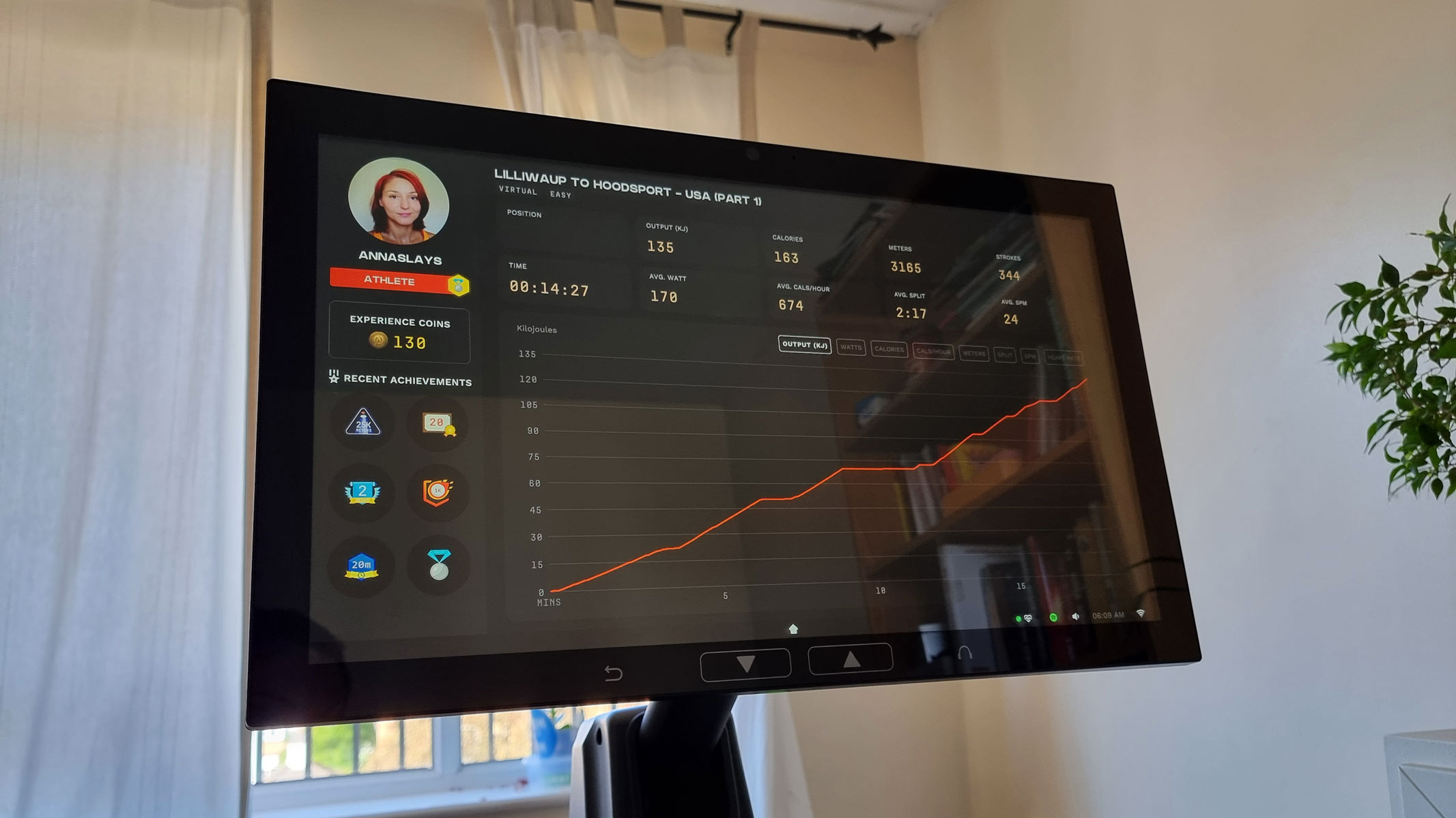 The workout stats screen on the Aviron Strong Series Rower