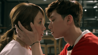 a man holds a woman's face as if they're about to kiss, in korean drama 'a witch's love'