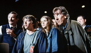 WarGames Dabney Coleman, Matthew Broderick, and Ally Sheedy stand in some bright light