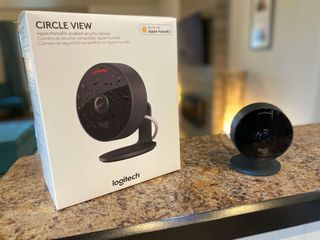 Logitech Circle View next to packaging on a counter top