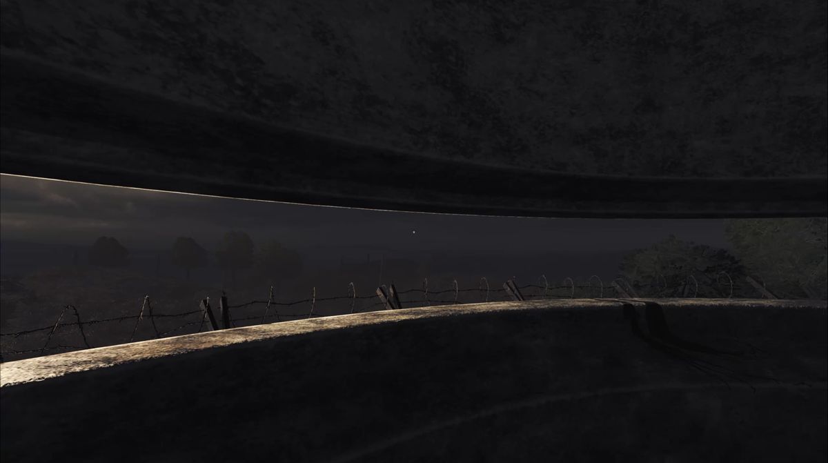 Looking out at dusky landscape through pillbox window