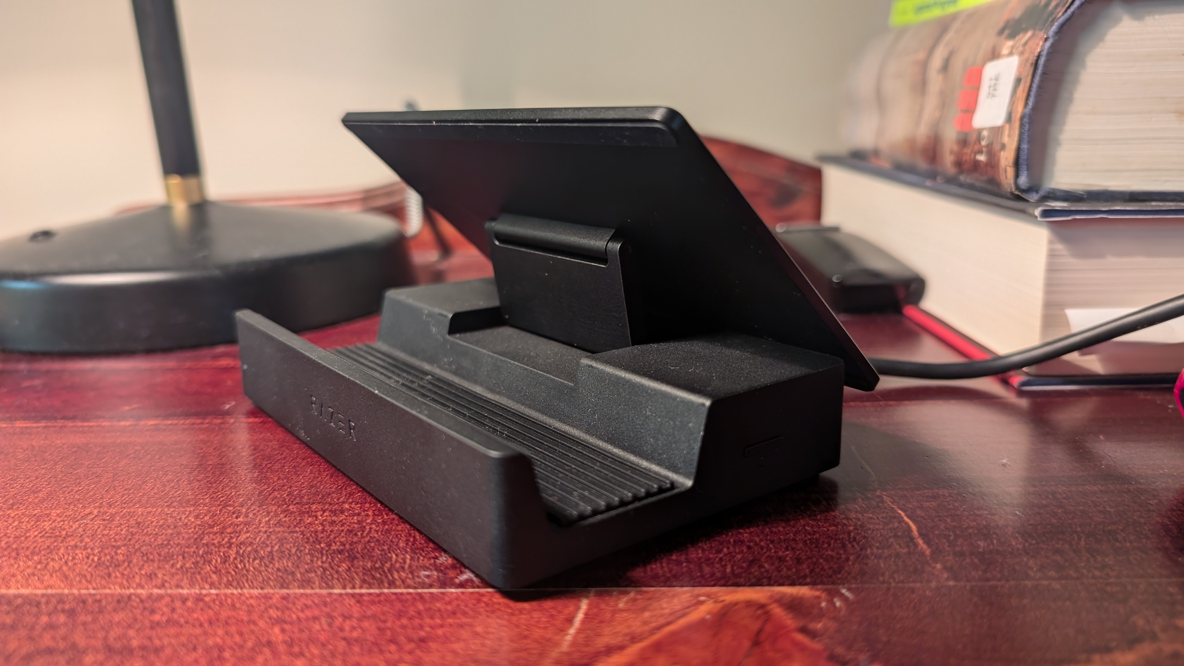 Razer Handheld Dock Chroma halfway through folding into its closed position