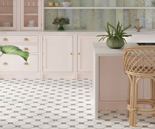 pink Shaker kitchen with green and white vintage style floor tiles