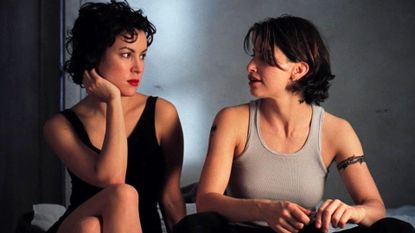 Jennifer Tilly and Gina Gershon look at each other