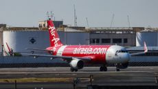 An AirAsia flight at Ninoy Aquino International Airport in Manila.