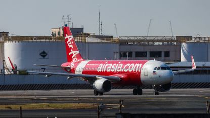 An AirAsia flight at Ninoy Aquino International Airport in Manila.