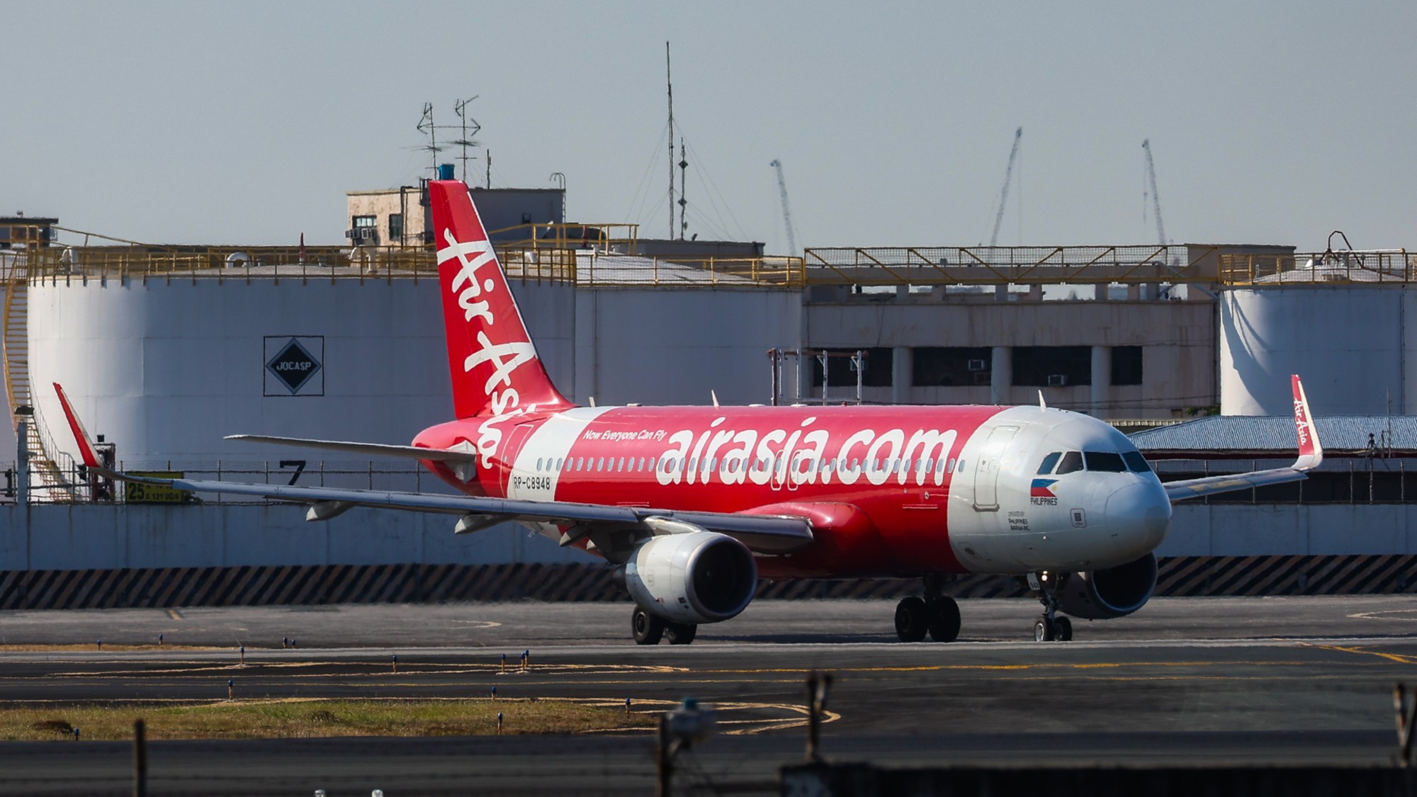 An AirAsia flight at Ninoy Aquino International Airport in Manila.