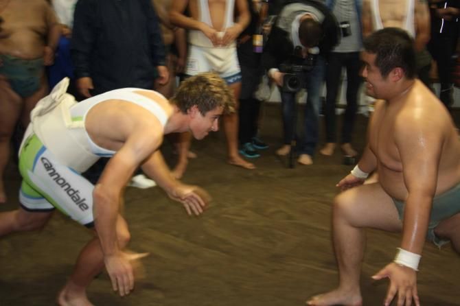 Peter Sagan dives into action in the sumo ring.