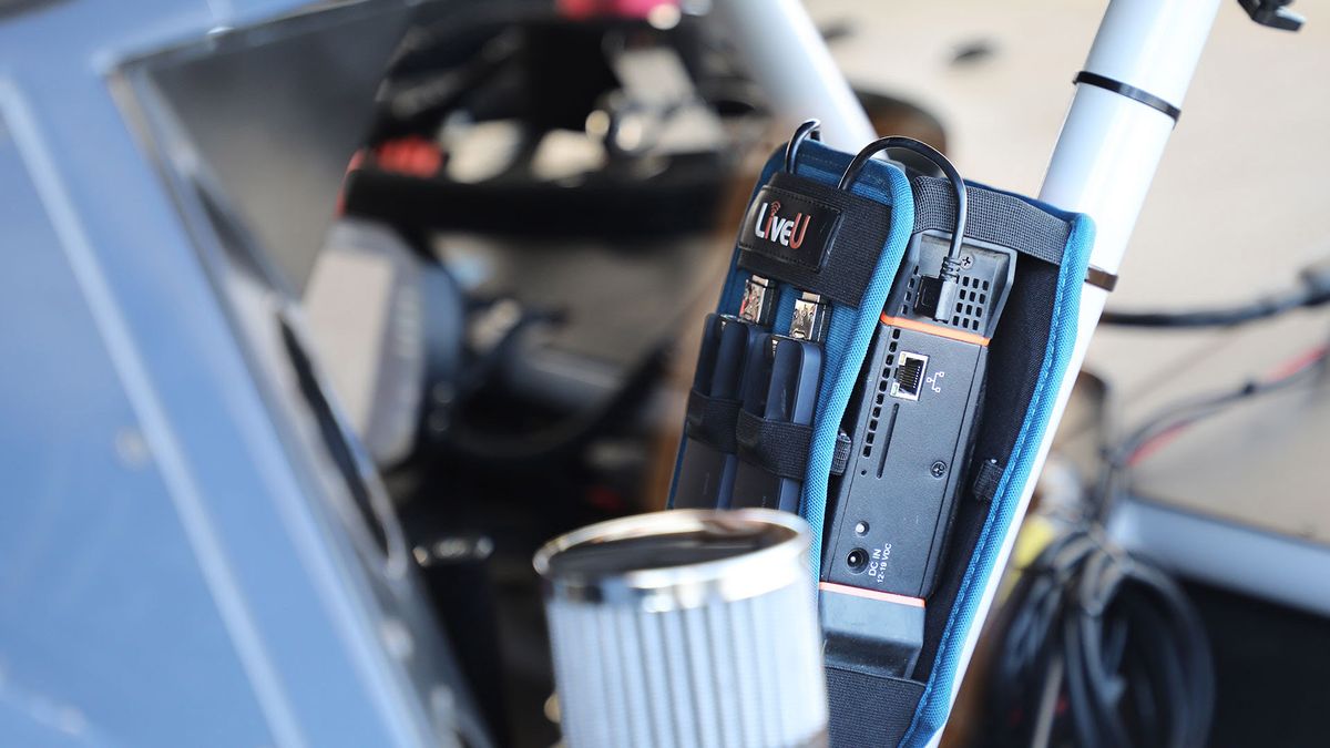 A LiveU in-car camera sits upon the wheel of a Trans Am on CBS.