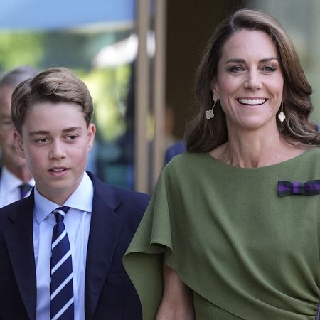 Prince George wears a navy suit with a light blue shirt and striped tie and has light brown hair, while his mom Princess Kate wears an olive green dress