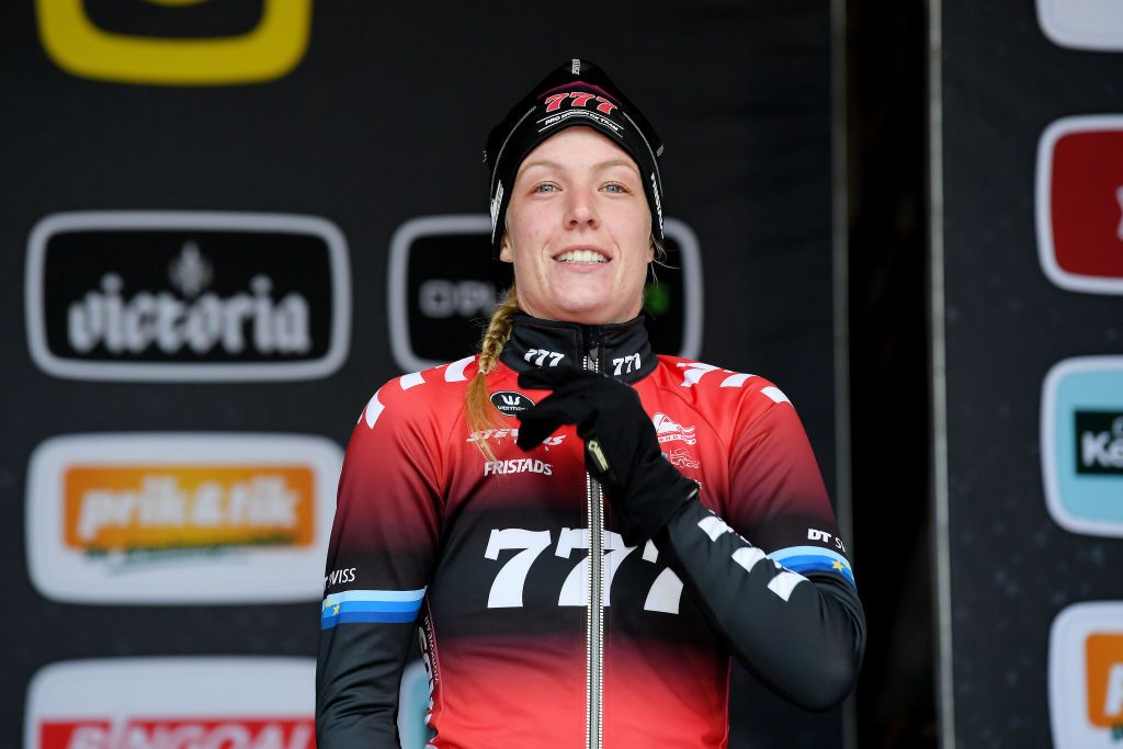 ZOLDER BELGIUM DECEMBER 27 Annemarie Worst of The Netherlands and Team 777 celebrates winning the third place on the podium ceremony after the 17th Superprestige HeusdenZolder 2021 Womens Elite SuperprestigeCX SPHeusdenZolder on December 27 2021 in Zolder Belgium Photo by Luc ClaessenGetty Images