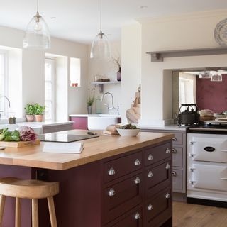 kitchen with red drawers and cookpot