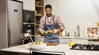 Photo of a man cooking a meal