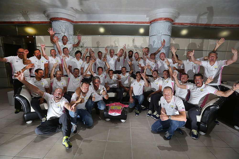 Tinkoff-Saxo Giro riders and staff celebrate Contador's win.