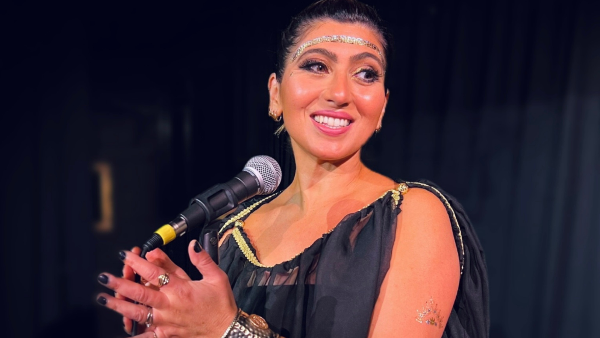 Olga Thompson performing on stage