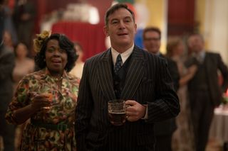 Ellen Thomas stars as Vi and Jason Isaacs as Archie in director Tony Fabian's MRS.HARRIS GOES TO PARIS, a Focus Features release.