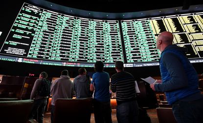 Bettors line up to place wagers for Super Bowl LI at the Race & Sports SuperBook at the Westgate Las Vegas Resort & Casino.