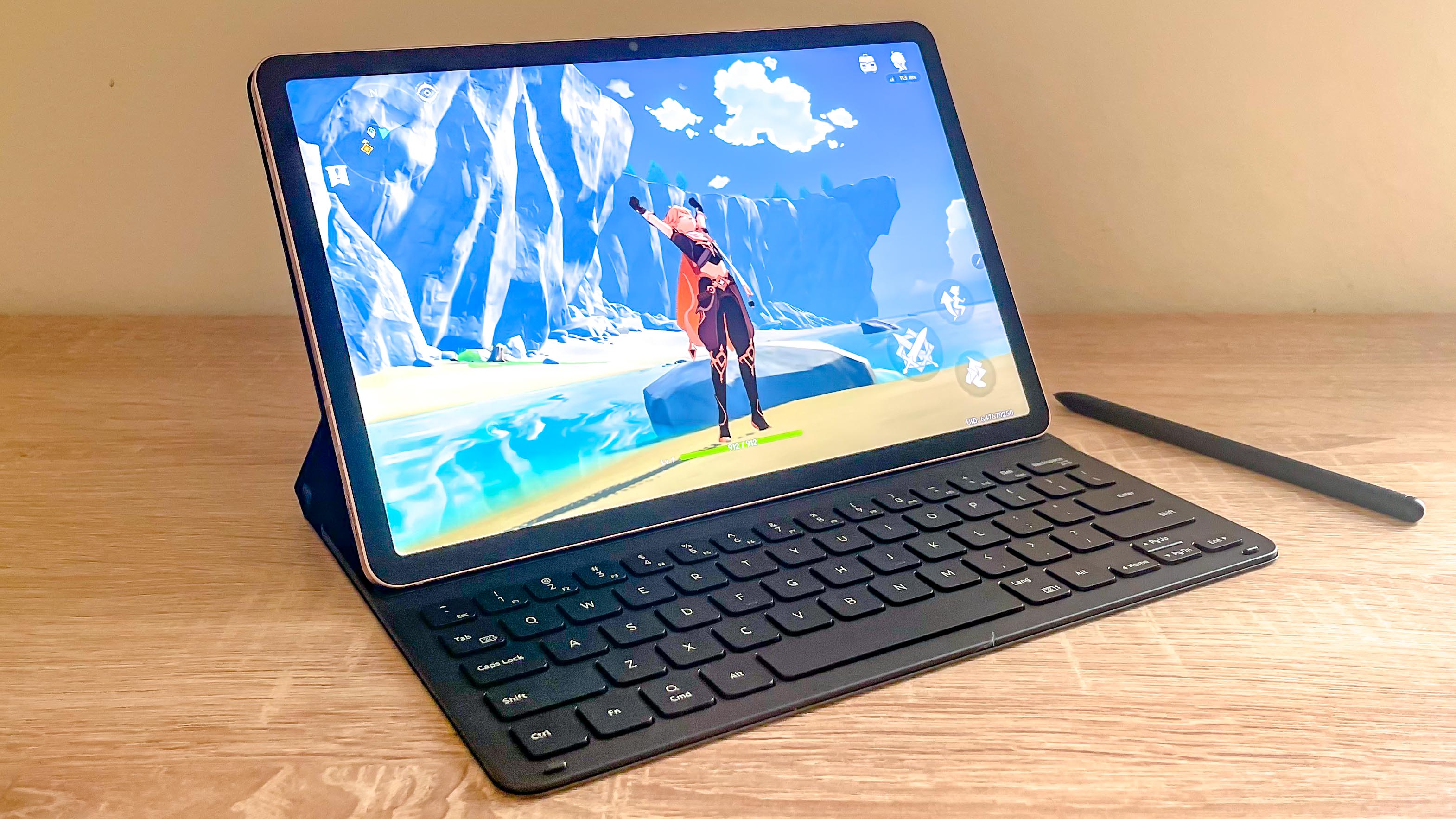 Samsung Galaxy Tab S8 opens to desk in keyboard cover facing right, showing Genshin Impact gameplay