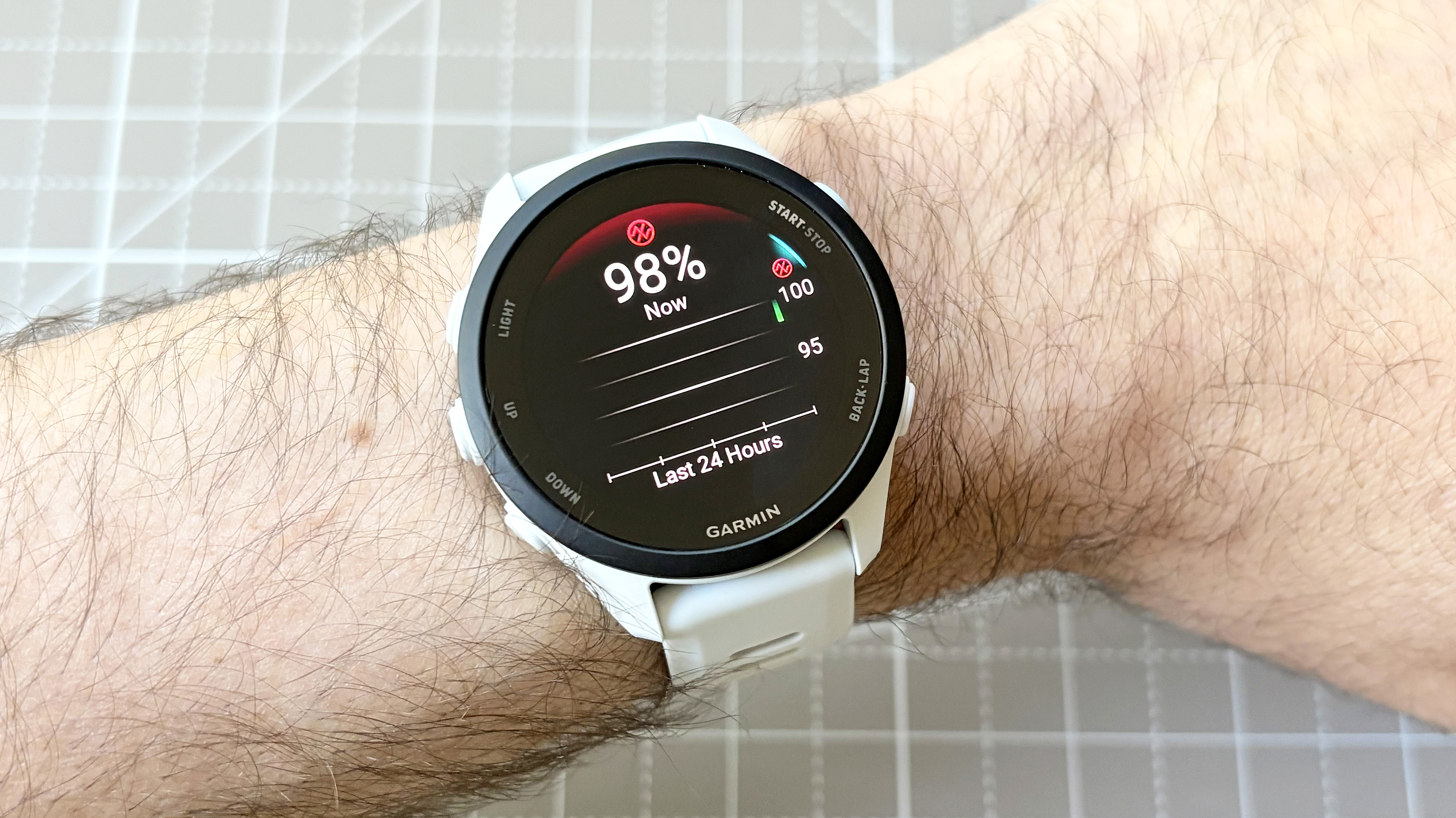 Close-up of the Garmin Forerunner 70 showing the blood ox measuring tool
