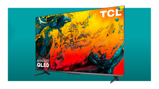 TCL TV in front of blue backdrop.