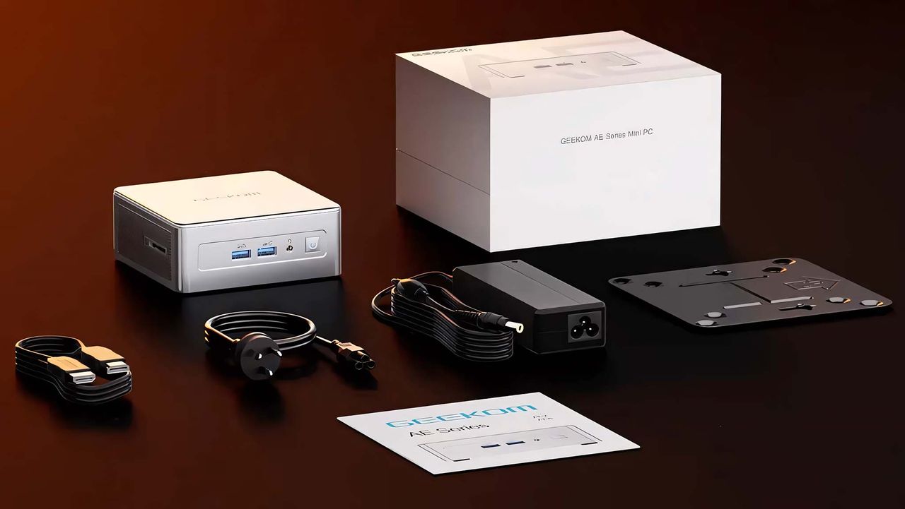 Geekom AE8 AI Mini PC next to HDMI cable, power adapter, user guide, and VESA mount.