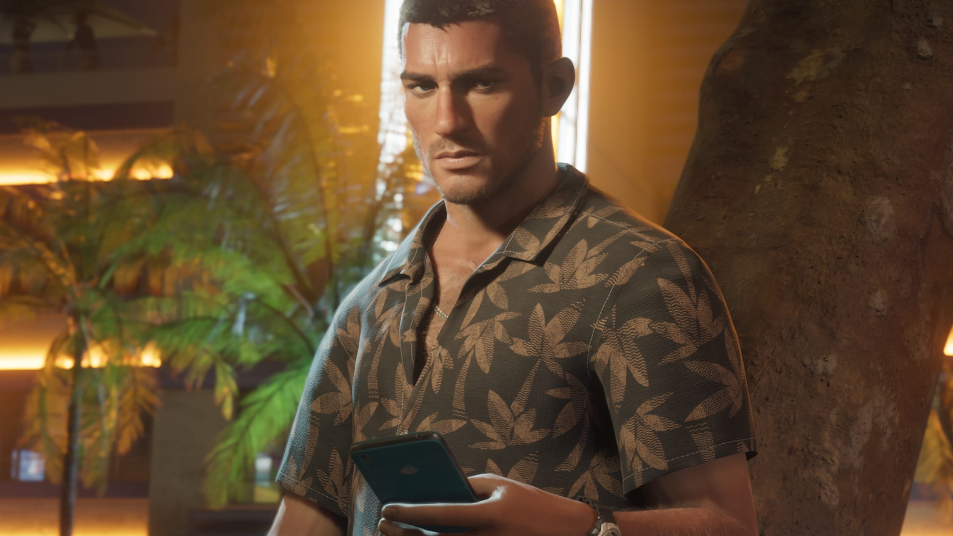 GTA 6 protagonist Jason holding a smartphone.