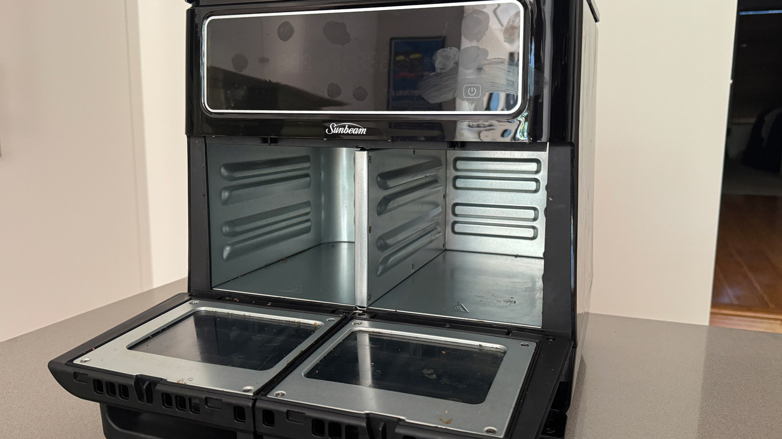 Internal cooking area of Sunbeam Multi Zone Air Fryer Oven with the middle partition installed