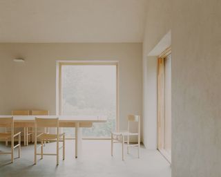 villa koppar by Studio Collaboratorio with its clean minimalist shapes and nordic style white and off white interiors