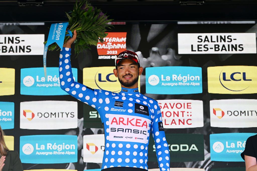 SALINSLESBAINS JUNE 08 Donavan Grondin of France and Team Arka Samsic celebrates at podium as Polka dot Mountain Jersey winner during the 75th Criterium du Dauphine 2023 Stage 5 a 1911km stage from CormoranchesurSane to SalinslesBains UCIWT on June 08 2023 in SalinslesBains France Photo by Dario BelingheriGetty Images