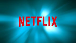 Netflix logo on blue light background
