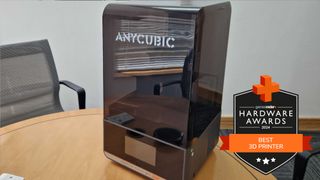 Anycubic Photon Mono M7 Pro 3d printer on a table with GamesRadar+ Hardware Awards badge