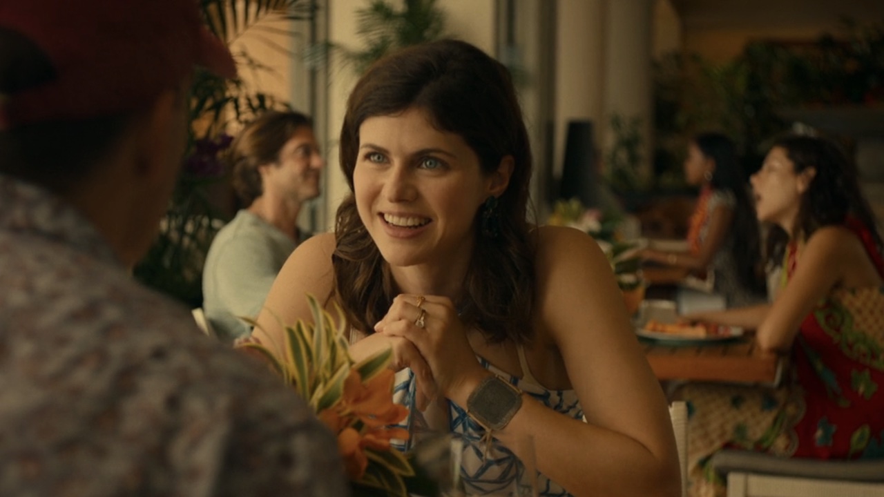 Alexandra Daddario smiling at breakfast on The White Lotus Season 1