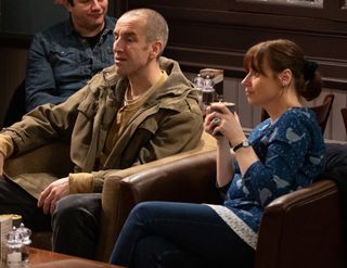 Lydia and Sam sitting in the Woolpack having a drink.