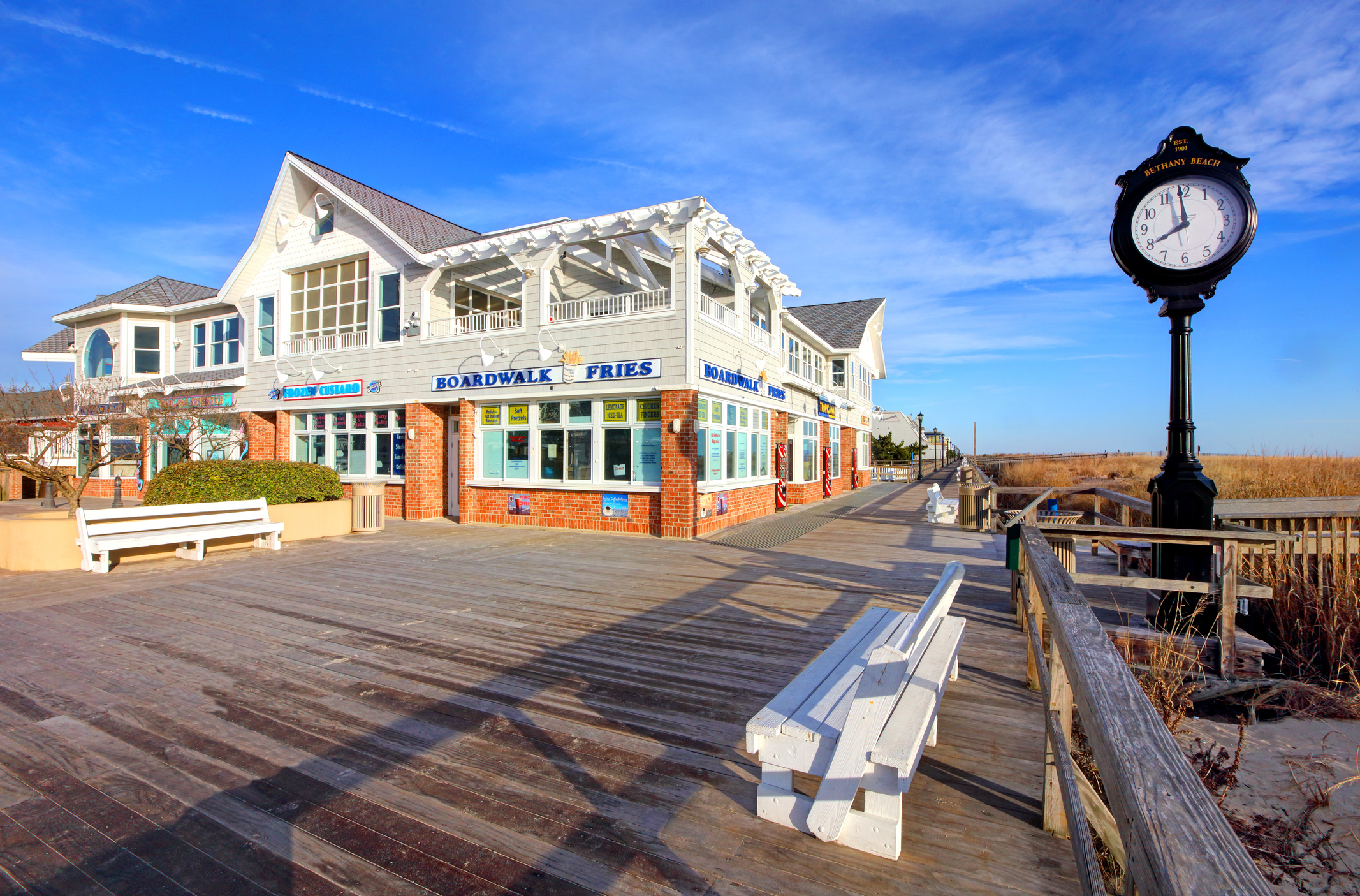 Bethany Beach, Delaware, USA - February 24, 2020: Morning view of shops along the boardwalk