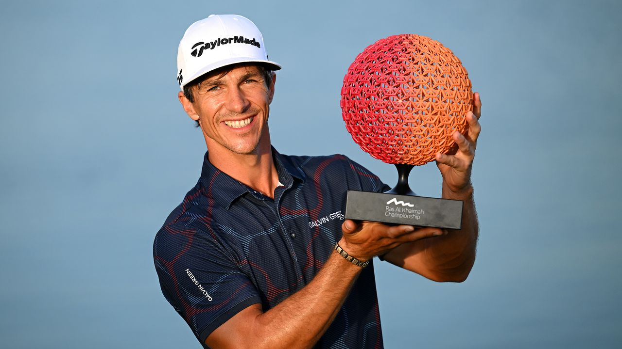 Thorbjorn Olesen with the Ras Al Khaimah Championship trophy