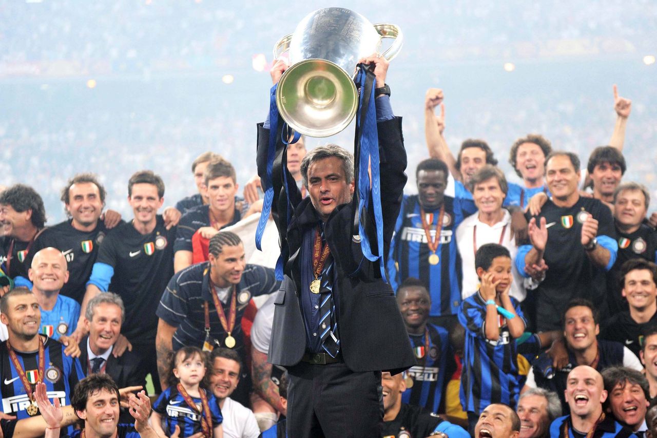 Inter Milan manager Jose Mourinho lifts the Champions League trophy after his side's victory over Bayern Munich in the 2010 final at the Santiago Bernabeu in Madrid, Spain