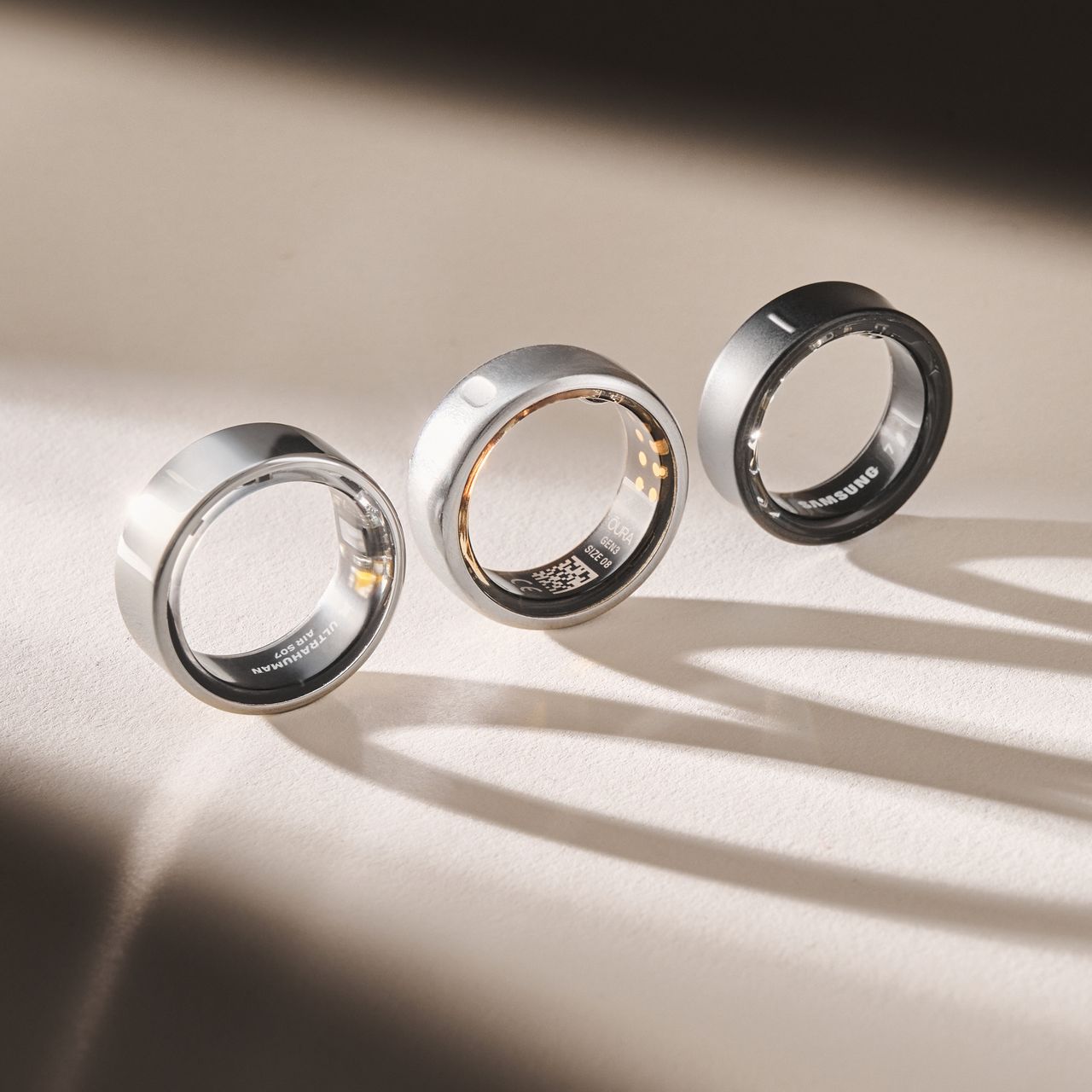 three fitness rings lit from the back