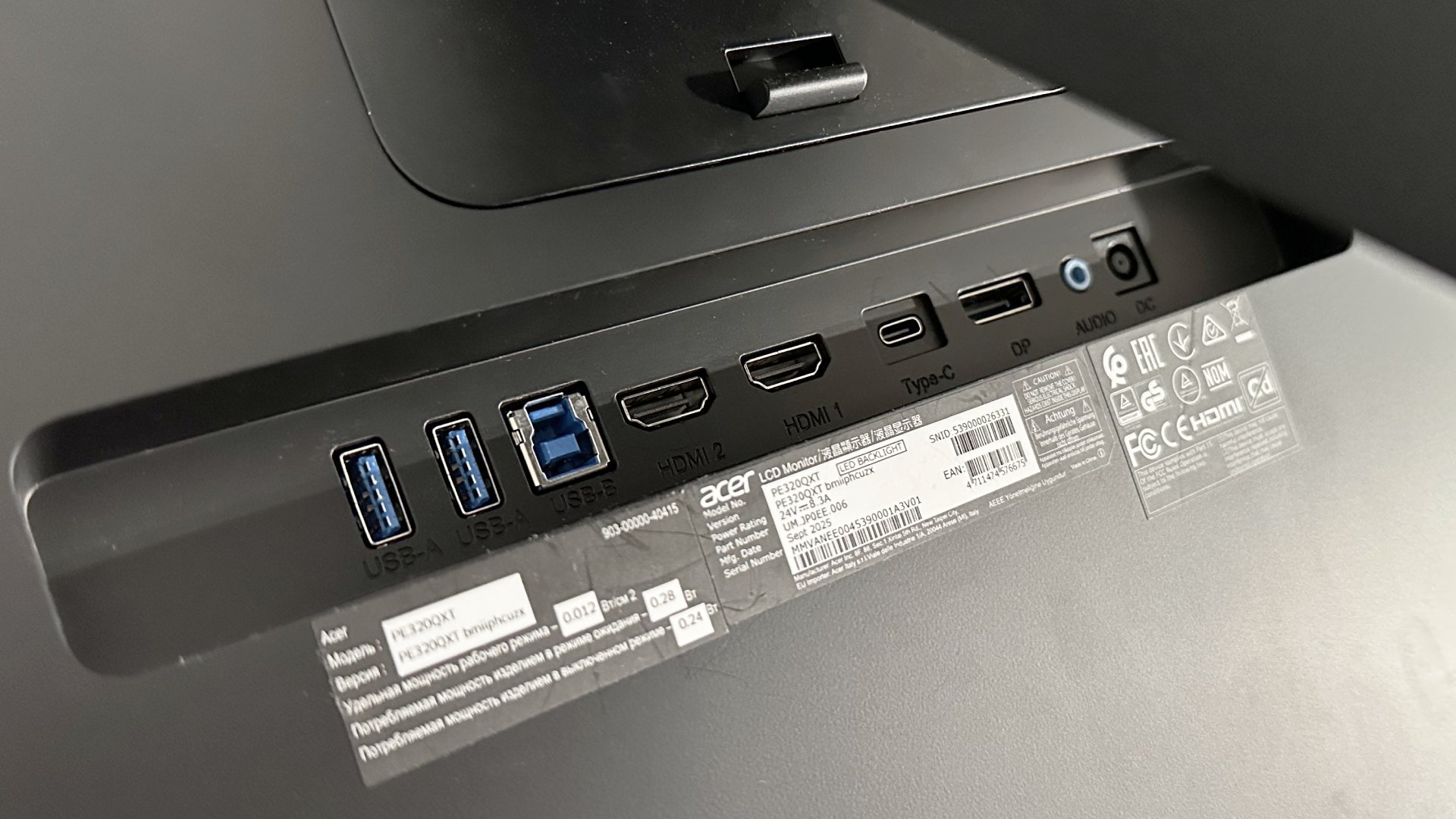 The Acer ProCreator PE320QXT on a desk in a home office during our testing process